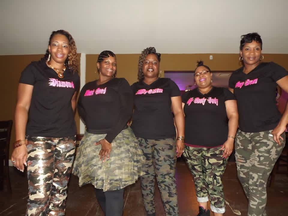 Five sisters — Diamond, Dream and friends — in camo and PPD tees.