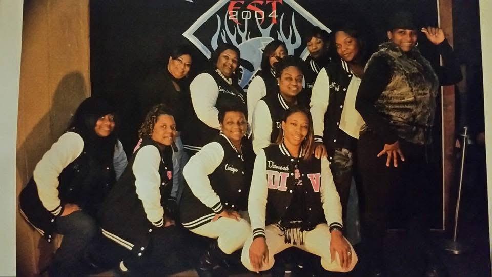 Founding-era PPD sisters in varsity jackets under the EST 2004 banner.