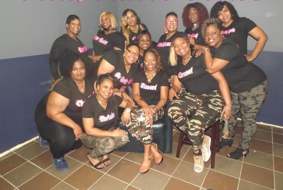 A larger PPD gathering in matching black tees and camo.